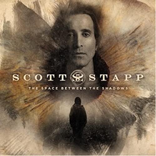 Scott Stapp album cover, portrait with wings and shadowed figure.