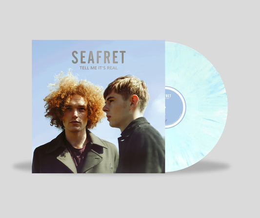Seafret album cover featuring two men and a glimpse of marbled vinyl.