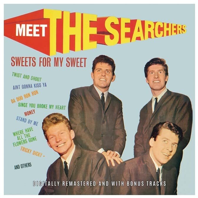Album cover for The Searchers’ “Meet The Searchers” with four band members.