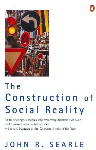Book cover featuring a street scene with traffic signs and people below title text.