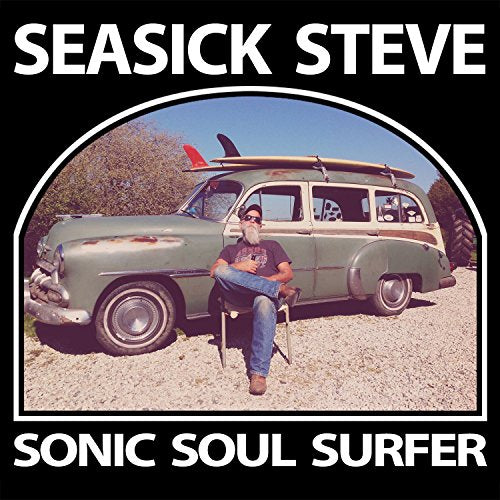 Seasick Steve album cover featuring a man with a vintage car and surfboard.