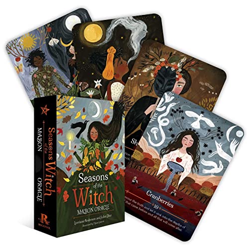 A box set and several illustrated oracle cards featuring mystical, autumnal, and nature-themed artwork.