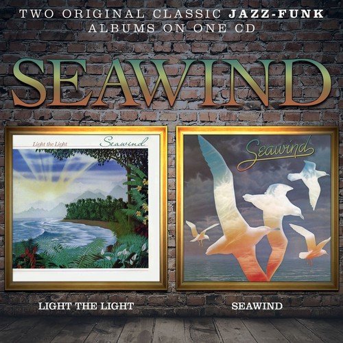 CD cover with two framed album art images on a brick wall background.