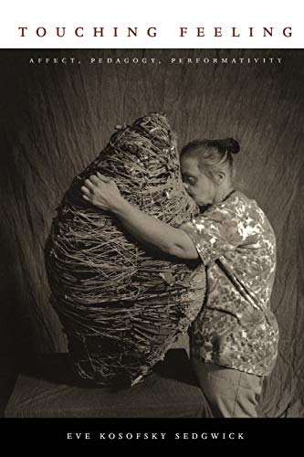 Book cover: woman embracing a large, textured, dark-colored form.