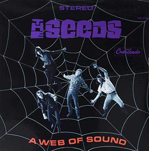 The Seeds album cover: a purple spiderweb with band members pictured.