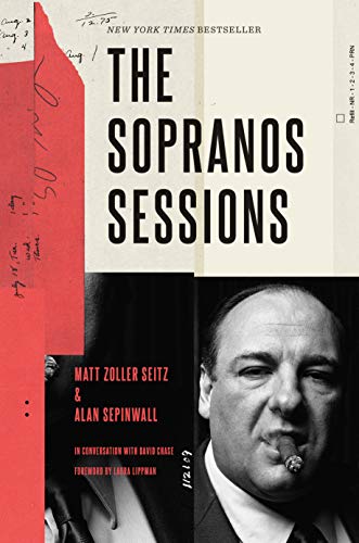 Book with David Chase and cast photos, likely on a white or dark background.