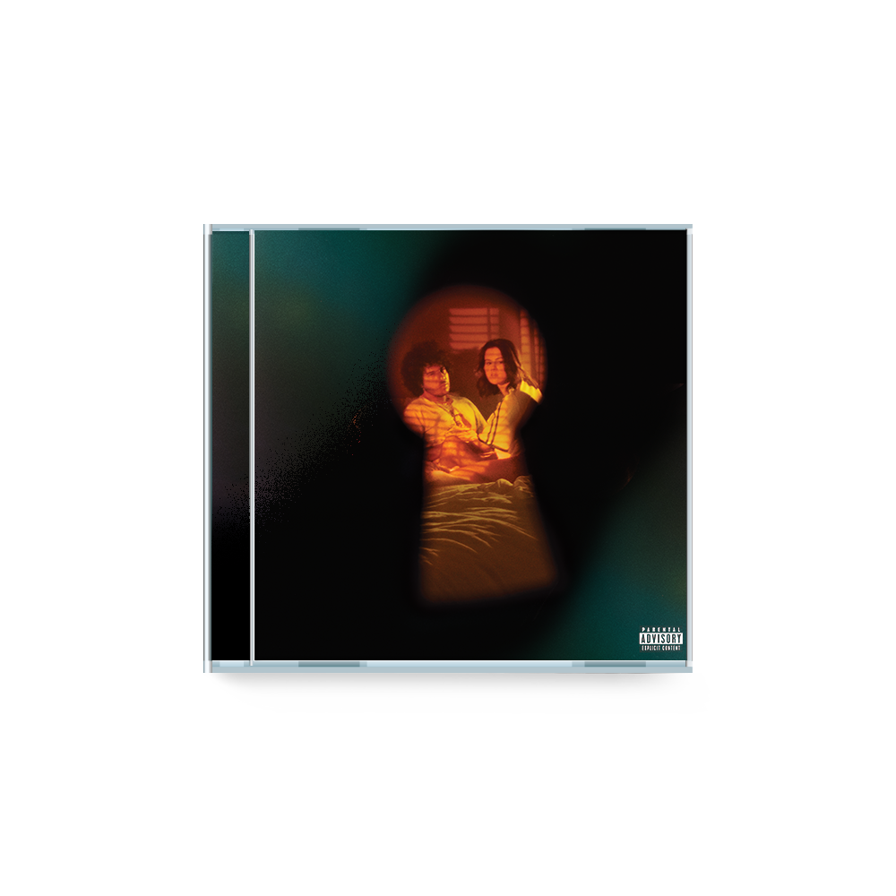 CD case with Selena Gomez and Benny Blanco framed in a keyhole.