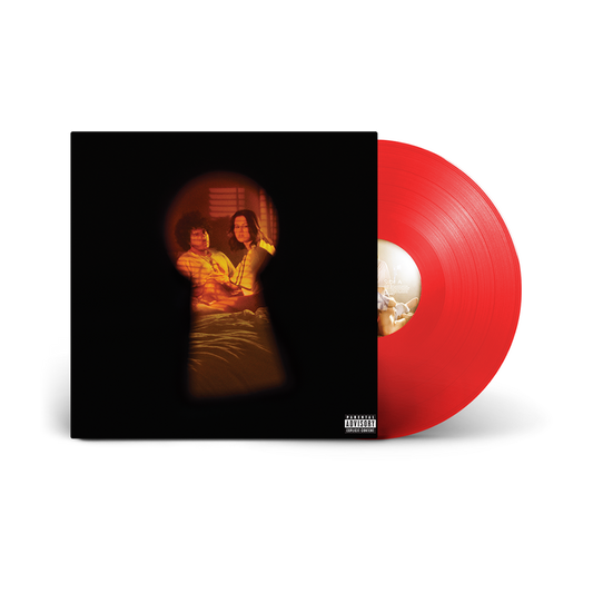 Vinyl record with red disc and album cover featuring two people.