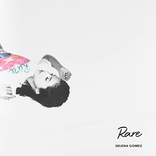 Selena Gomez lying on a white background with the album title Rare printed below.