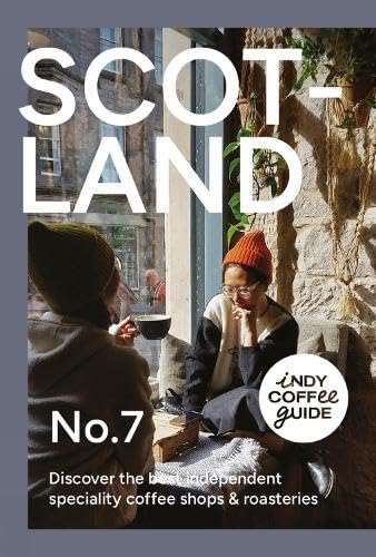 Two people sit in a sunlit cafe with the text Scotland No. 7 overlaid.