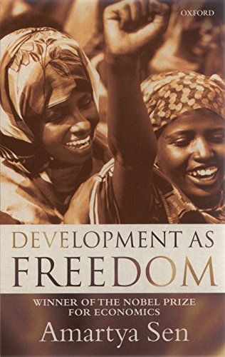 Book cover: "Development as Freedom" by Amartya Sen, with smiling people.
