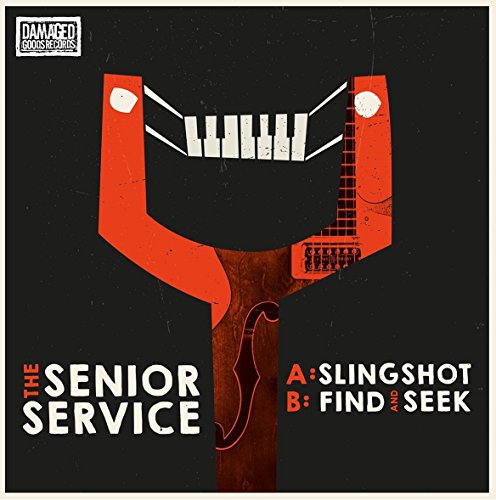 Record cover with red abstract shape resembling musical instruments.