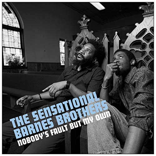 Black and white album cover with two men sitting in a church pew.