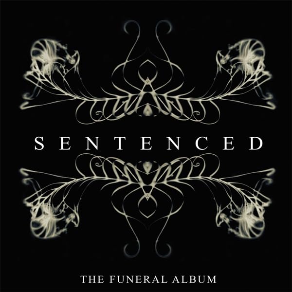 Sentenced album cover: dark, ornate design with band name and title.