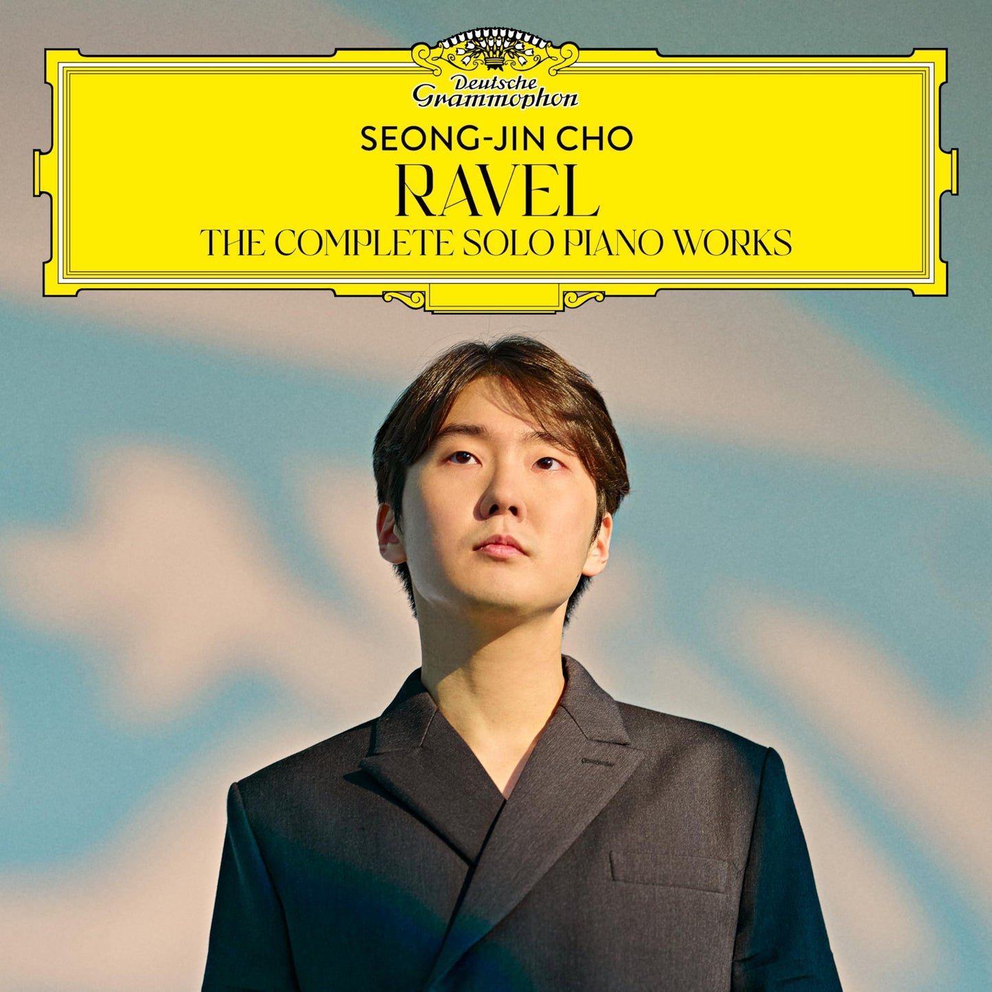 CD cover featuring pianist Seong-Jin Cho against a blue sky.
