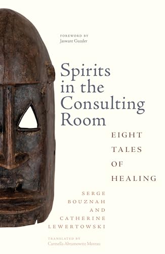 Book cover with a dark wooden mask and title "Spirits in the Consulting Room.