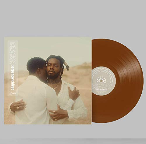 Brown vinyl record with album cover depicting two embracing men.