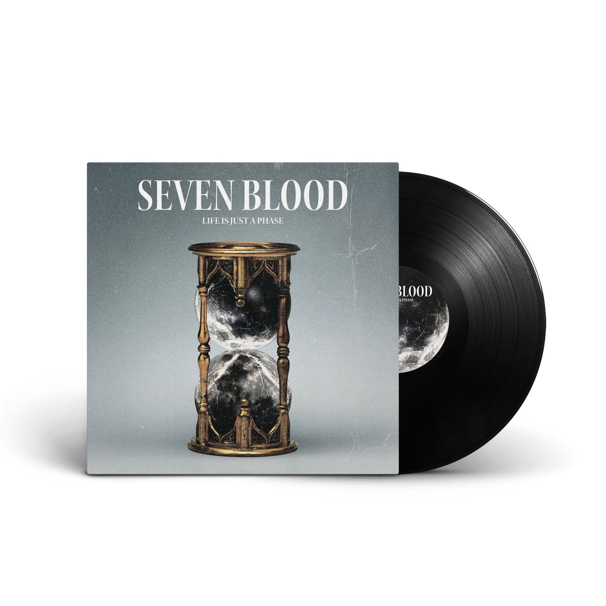 Vinyl record and album cover featuring an ornate hourglass on a grey background.