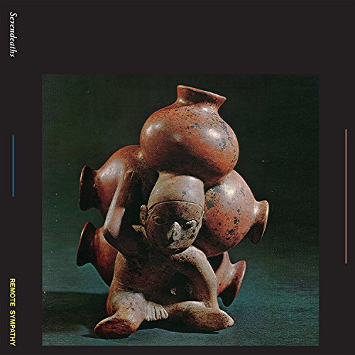 A terracotta figure carrying several clay pots on its back against a dark background.