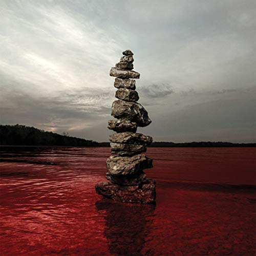The image is a CD cover for the album "Blood & Stone" by Sevendust. A concise, descriptive alt text for the image is: "CD cover with a rock tower in red water."