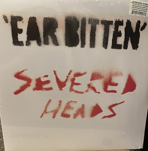Vinyl record with distressed red and black text: "Ear Bitten" by Severed Heads.