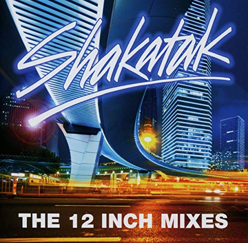 Shakatak album cover with stylized text over a city skyline at night.