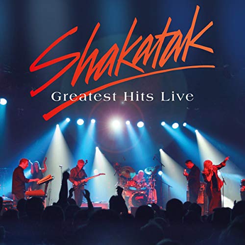 Shakatak’s “Greatest Hits Live” CD cover with a band performing onstage.