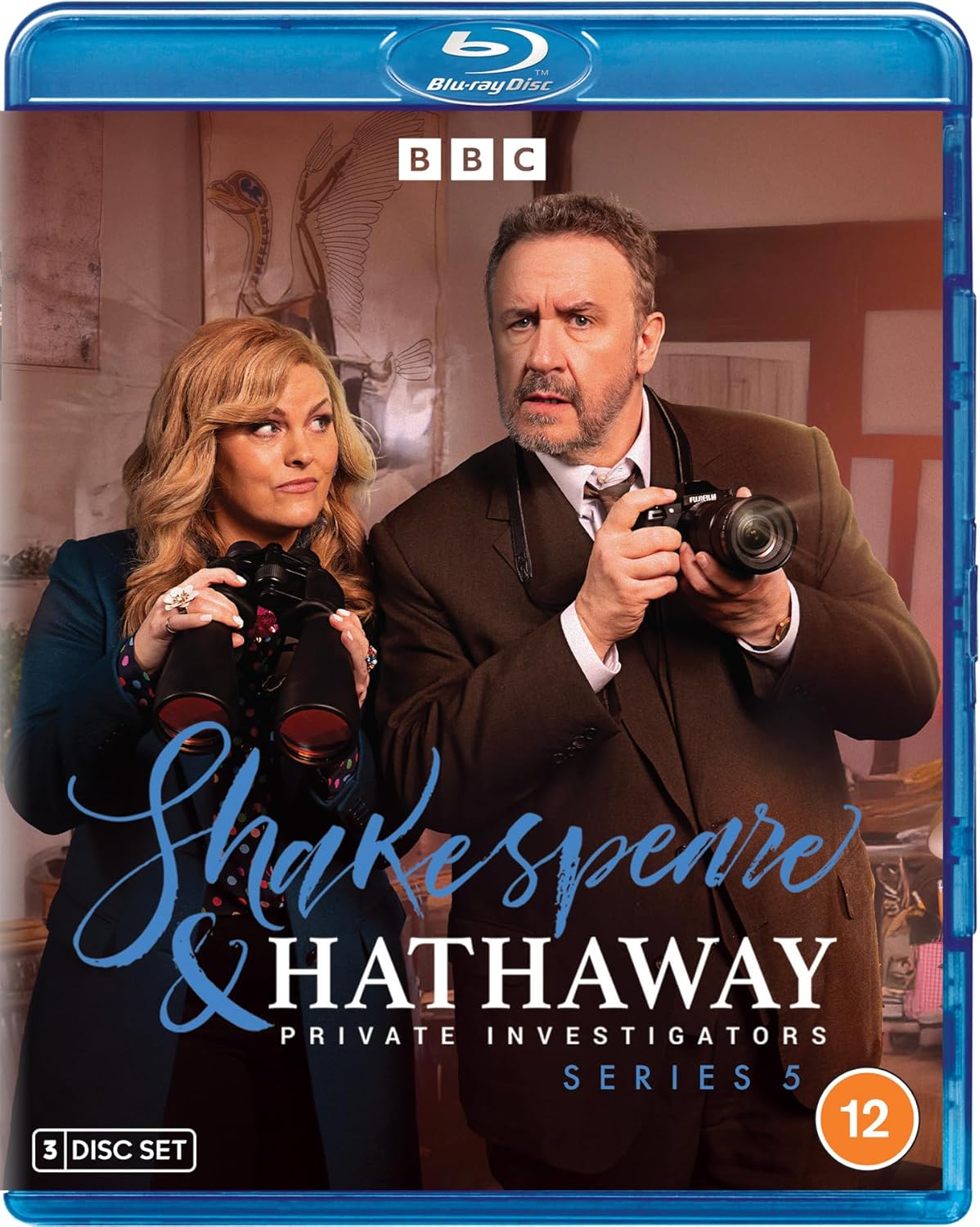 Blu-ray cover featuring a man with a camera and woman with binoculars.