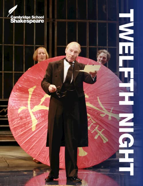 Book cover showing a man in a suit holding a card before a red umbrella.