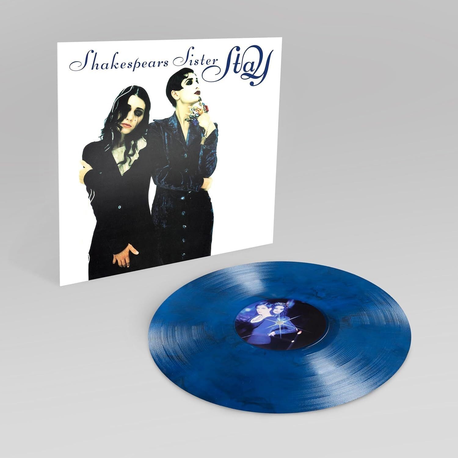 Vinyl record and album cover for Shakespears Sister’s “Stay”, featuring two figures.