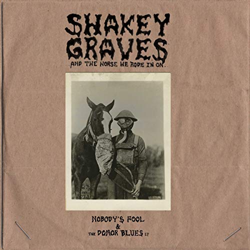 Album cover featuring a vintage photo of a horse and person in costume.