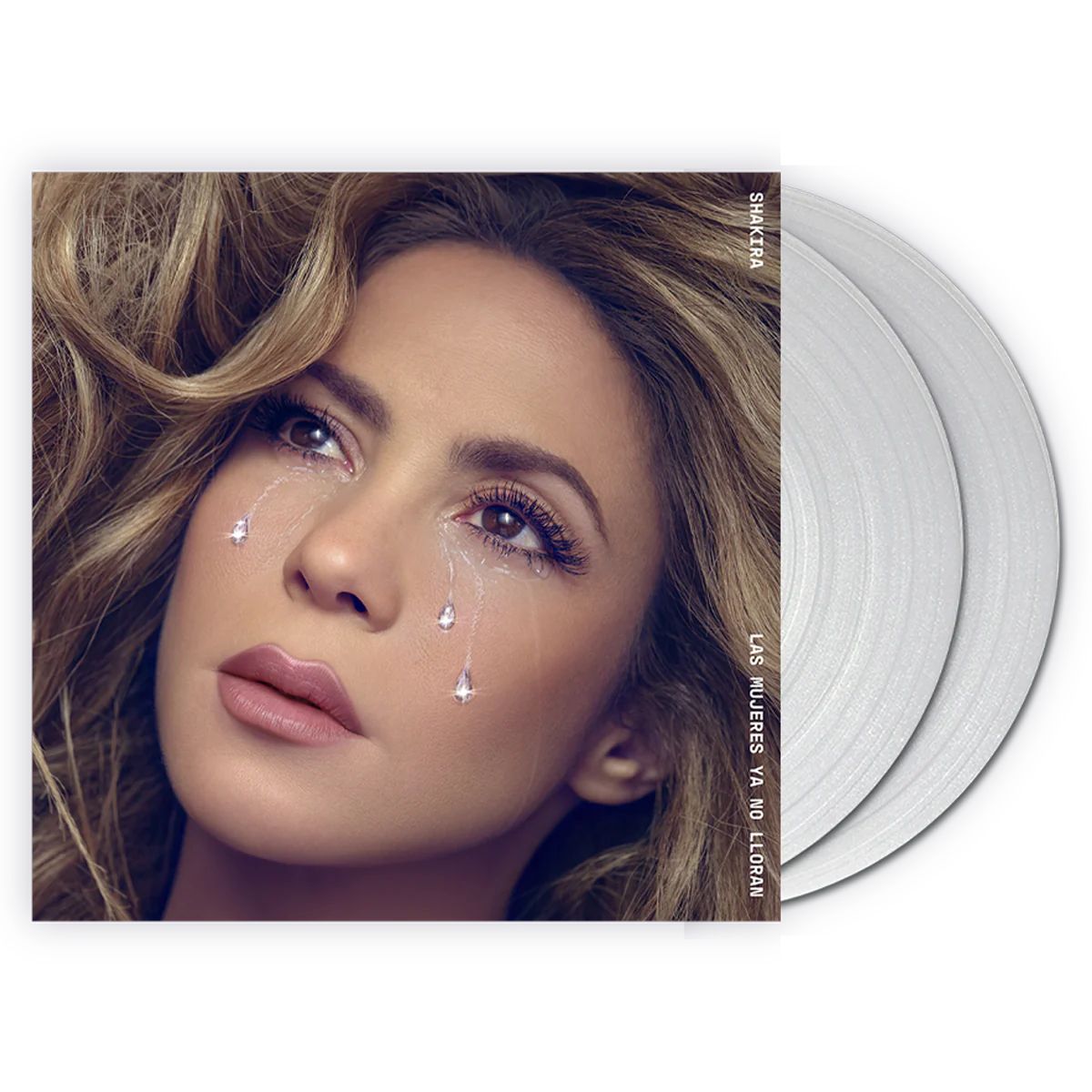 Shakira album cover with a close-up portrait and vinyl record.