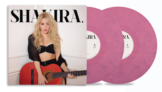 Shakira album cover and two pink vinyl records displayed together.