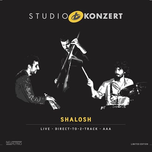 Black and white album cover featuring three musicians playing instruments.