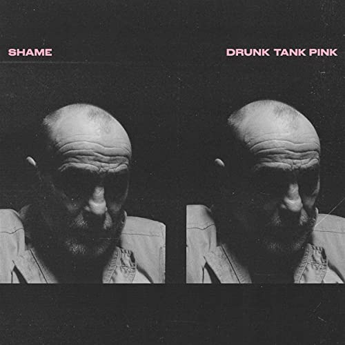 Album cover showing two identical black and white portraits of a man side-by-side.