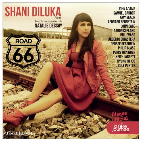 CD cover: pianist Shani Diluka poses near railroad tracks and a Route 66 sign.