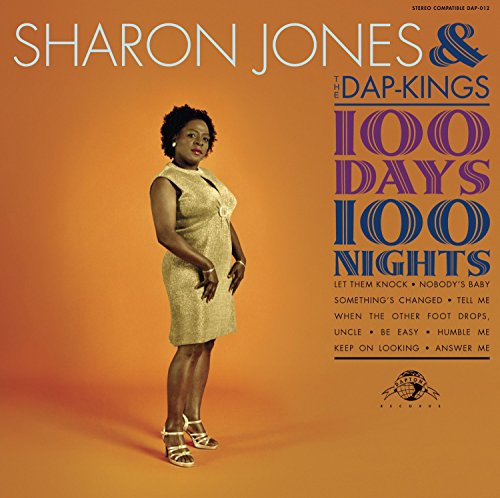 Sharon Jones in a gold dress against an orange background with album text.