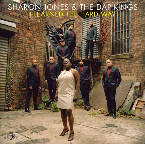 Sharon Jones & The Dap-Kings album cover featuring a group in suits.