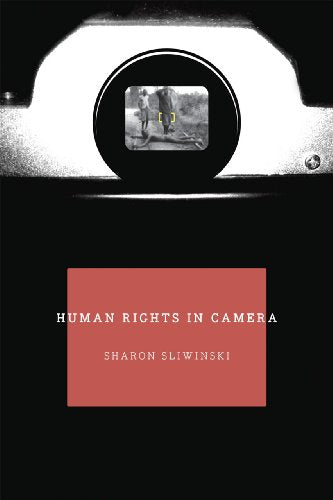 Book cover: camera with image in viewfinder, red title panel.