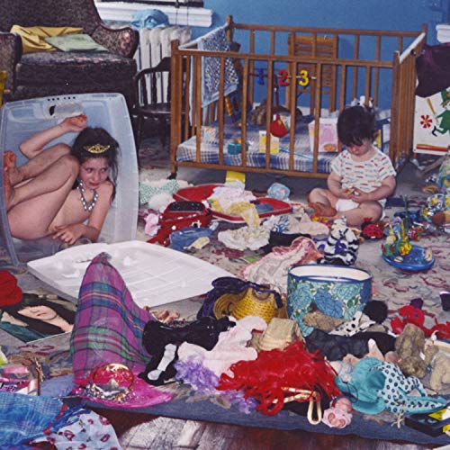 Album cover with two young children in a cluttered playroom scene.