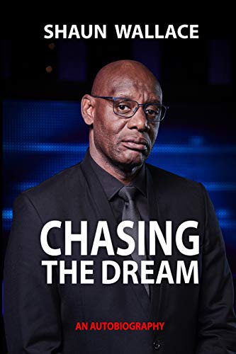 Book cover featuring Shaun Wallace in a black suit against a dark blue background.