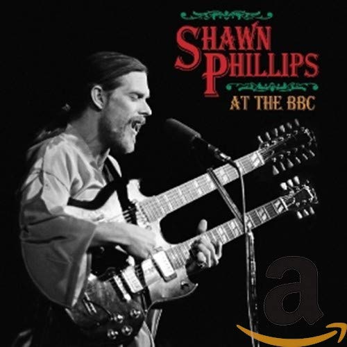 Shawn Phillips playing a double-necked guitar, album cover for "At The BBC".
