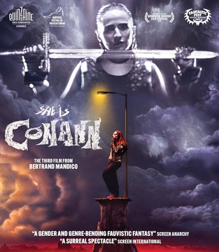 “She Is Conann” Blu-ray cover featuring a woman with a sword against a stormy sky.