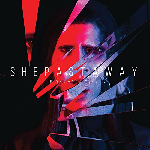 Album cover featuring a distorted portrait of a person with red lighting.