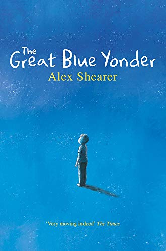 A boy floats in space with stars and a blue background behind him.