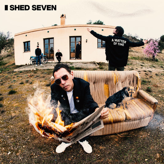 Album cover for Shed Seven’s “A Matter of Time” featuring surreal imagery.