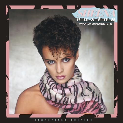 Sheena Easton portrait wearing a pink and black animal print scarf on album cover.