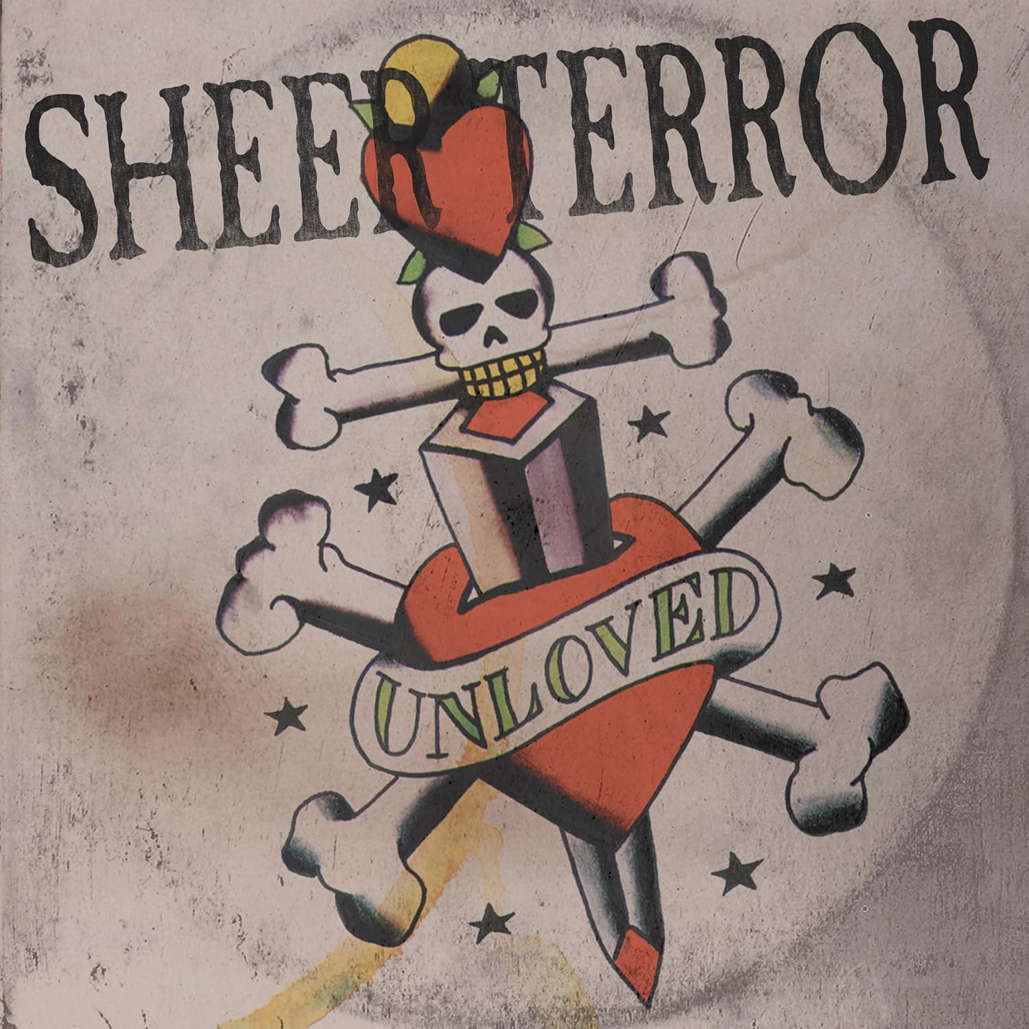 Record album cover with skull, bones, heart, and band name "Sheer Terror".