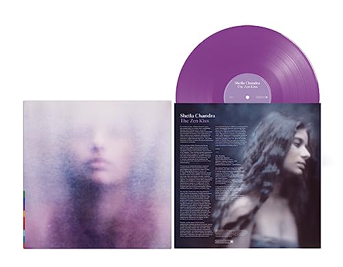 Purple vinyl record and album cover featuring a blurred portrait of a woman.