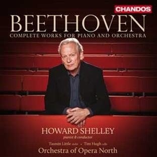 "CD cover with man in suit, red seats, and Beethoven text."